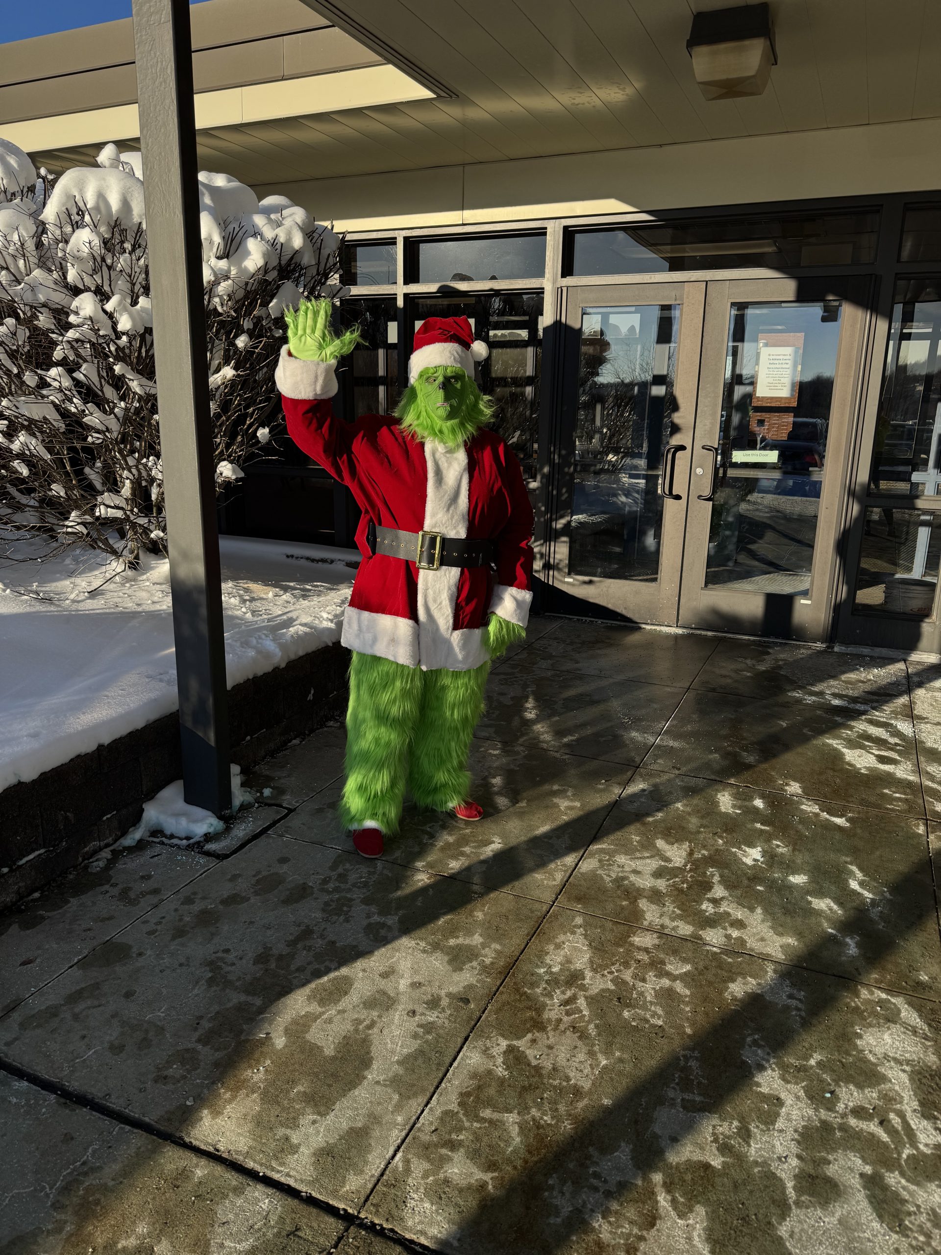 Grinch Welcomes Students at PCMS